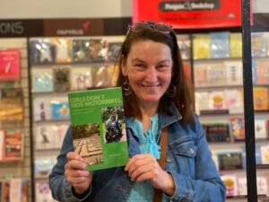 Dorit, Family Constellations expert, holding up her memoir.